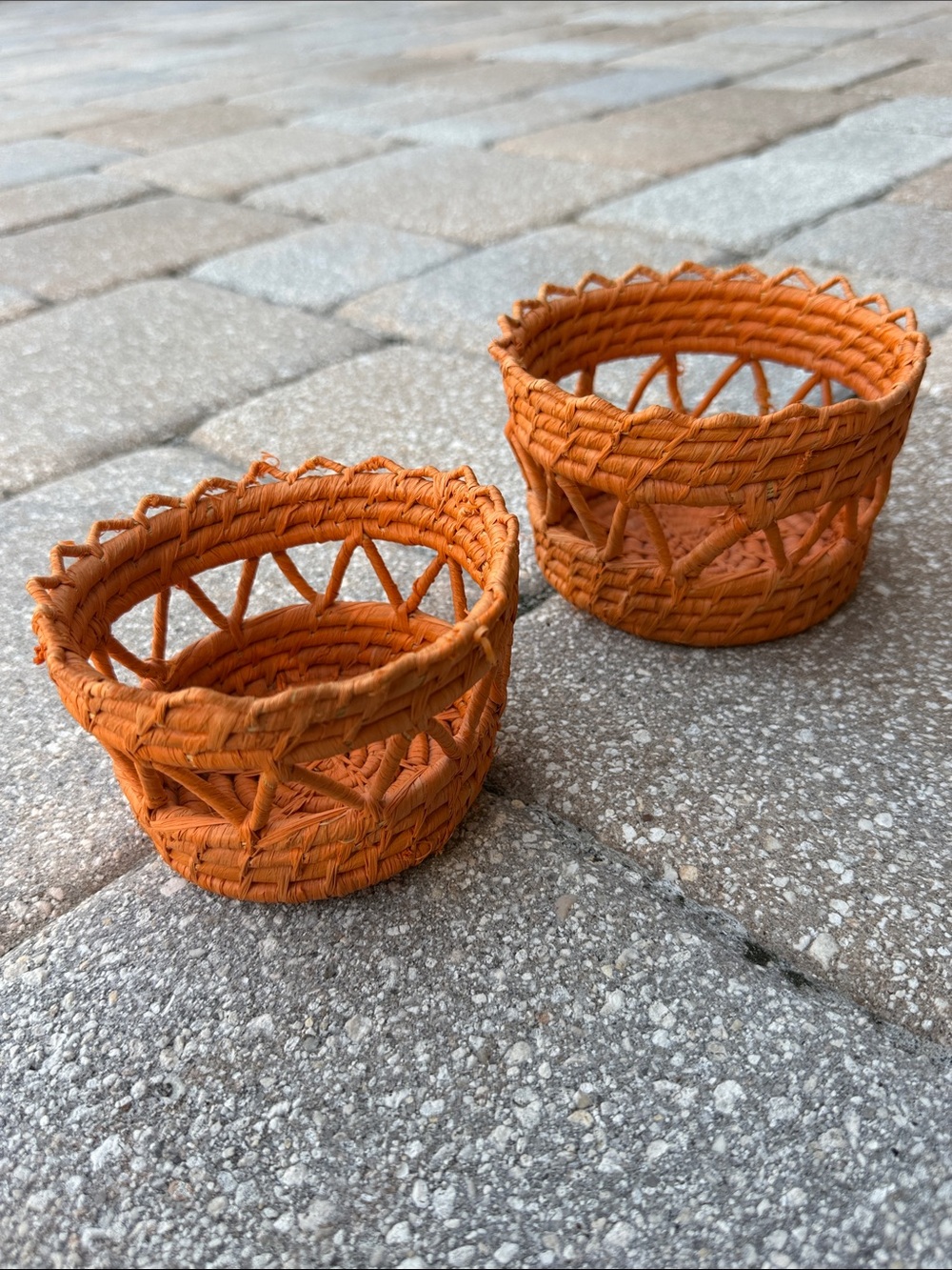 Orange wicker nesting baskets